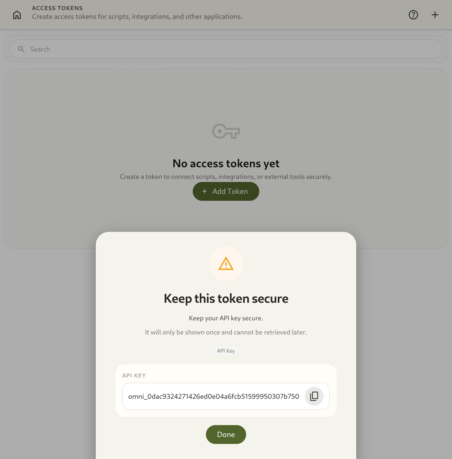 Access token creation modal showing name input and one-time secret reveal
